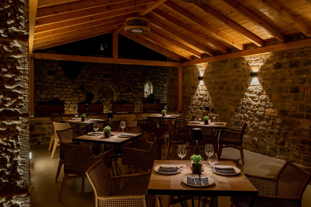 Dinner served on the terrace overlooking Oitylo Bay at Manifest Boutique Hotel